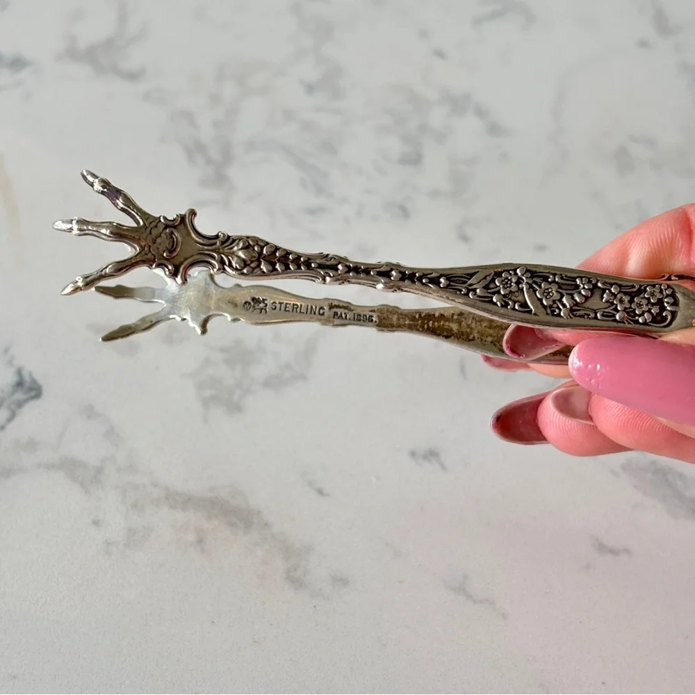 Antique sterling sugar tongs made by Whiting Manufacturing Co